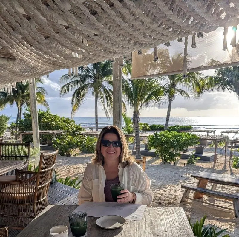 Lada Markman with a green juice at the beachfront restaurant at Palmaïa, The House of AiA, Riviera Maya